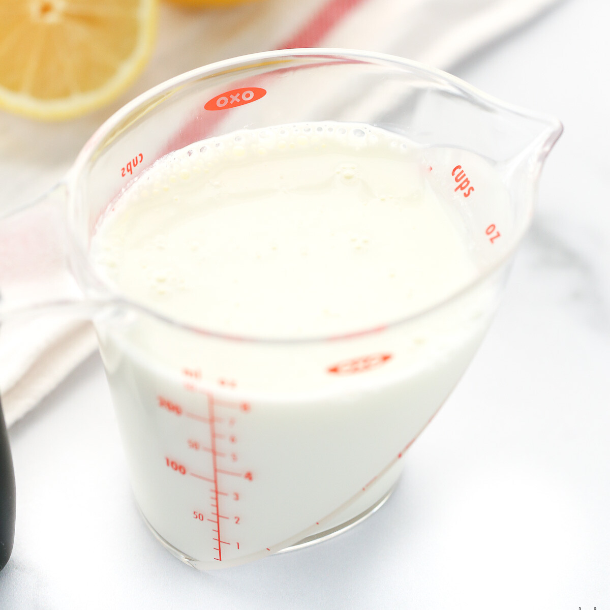 how many calories in 1/4 cup of buttermilk?